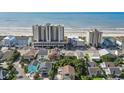 Beautiful aerial view of condo and neighborhood with the beach in background at 1003 S Ocean Blvd. # 802, North Myrtle Beach, SC 29582