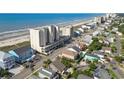 Aerial view showcasing the condo's proximity to beach, nearby streets, and landscaping at 1003 S Ocean Blvd. # 802, North Myrtle Beach, SC 29582