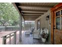 Charming porch area with comfortable seating, perfect for enjoying the outdoors at 325 Orange St., Georgetown, SC 29440
