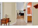 Warm entryway showcases the open floor plan connecting the living area, kitchen, and bathroom at 447 Mahogany Dr. # 102, Murrells Inlet, SC 29576