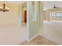 Bright living room with modern color scheme, decorative columns and carpeted floor at 56 Willowbend Dr., Murrells Inlet, SC 29576