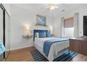 Cozy bedroom featuring a comfortable bed, stylish decor, and ample natural light at 901 W Port Dr. # 2114, North Myrtle Beach, SC 29582