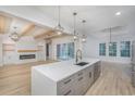 Bright kitchen featuring a large center island, stainless steel appliances, and an open view to the living area at 1054 East Isle Of Palms Ave., Myrtle Beach, SC 29579