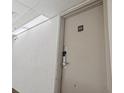 Hallway view of unit #208 door with secure lock at 1605 S Ocean Blvd. # 208, Myrtle Beach, SC 29577