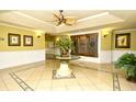 Welcoming lobby featuring tile flooring, a decorative fountain and stylish furnishings at 2180 Waterview Dr. # 1013, North Myrtle Beach, SC 29582