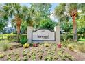 Ironwood community entrance sign surrounded by well-kept landscaping at 5801 Oyster Catcher Dr. # 832, North Myrtle Beach, SC 29582