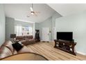 Comfortable living room with a ceiling fan, tile floor, and television at 120 River Country Dr., Conway, SC 29526