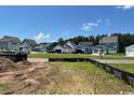 Street view of neighborhood with multiple houses in the distance at 1627 Sayebrook Pkwy., Myrtle Beach, SC 29588