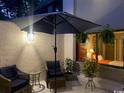 Cozy outdoor patio setting, ideal for relaxing with comfortable seating and garden views at 18 Canvas Back Cove # 122, Georgetown, SC 29440