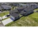 Areal view of new construction home featuring a three car garage and a breezeway at 287 West Palms Dr., Myrtle Beach, SC 29579
