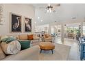 Bright living room with high ceilings, neutral decor, comfortable seating and an open floor plan at 312 Caldera Ct., Murrells Inlet, SC 29576