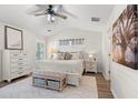 Serene main bedroom with vaulted ceiling, white furniture, and ample natural light at 312 Caldera Ct., Murrells Inlet, SC 29576