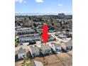 An aerial view of the neighborhood highlights the property's location, mature trees, ocean views, and community amenities at 6619 Colonial Dr., Myrtle Beach, SC 29572
