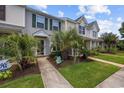 Inviting townhome with well-manicured lawn and tropical landscaping at 807 Wilshire Ln. # 807, Murrells Inlet, SC 29576