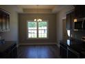 Dining room featuring modern chandelier and view of the backyard at Tbd 222 Persimmon Rd., Aynor, SC 29511