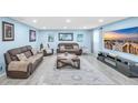Comfortable living room with light blue walls, recessed lighting, and modern furniture at 180 Weeping Willow Dr., Myrtle Beach, SC 29579