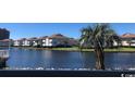 Scenic view of the pond surrounded by multiple buildings with waterfront access at 1919 Spring St. # B12, North Myrtle Beach, SC 29582