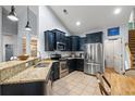 Modern kitchen featuring stainless steel appliances, granite countertops, and ample cabinet space at 221 Rivers Edge Dr., Conway, SC 29526