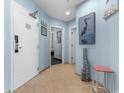 Inviting entryway with tiled floor, coastal decor, and convenient access to the bedrooms at 300 N Ocean Blvd. # 128, North Myrtle Beach, SC 29582