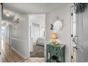 Hallway featuring tile floors, nautical decor, leading to the bedroom and main living area at 2501 S Ocean Blvd. # 508, North Myrtle Beach, SC 29582