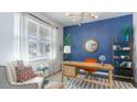 Bright office space with modern decor, a stylish desk, and a large window for natural light at 3525 Ashridge Way, Conway, SC 29526