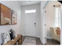 Inviting entryway with wood flooring and stylish decor for a warm welcome at 3530 Ashridge Way, Conway, SC 29526