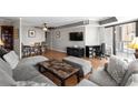 Cozy living room featuring contemporary furnishings, hardwood floors, and a stylish gray color scheme at 400 20Th Ave. N # 606, Myrtle Beach, SC 29577