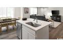 Bright kitchen boasts a center island with stainless steel appliances at 443 Myrtle Meadows Dr, Conway, SC 29526