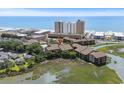 Beautiful aerial view of the condo complex near the beach with a marsh on the other side at 9501 Shore Dr. # B-224, Myrtle Beach, SC 29572
