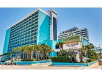 Striking Landmark Resort exterior featuring multiple floors, palm trees, and prime location close to the beach at 1501 S Ocean Blvd. # 1048, Myrtle Beach, SC 29577
