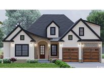 Beautiful two-story home with stone accents, carriage garage, and charming front porch at 2205 Yellow Morel Way, Myrtle Beach, SC 29579