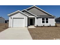 Charming single-story home with gray siding, attached garage, and well-maintained lawn at 1153 Cherrystone Loop, Conway, SC 29526