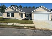 Charming single-story home with a well-manicured lawn and attached garage at Tbd20 Privetts Rd., Conway, SC 29526