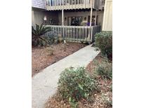 Inviting patio with seating area, perfect for relaxing outdoors at 118 Salt Marsh Circle # 25B, Pawleys Island, SC 29585