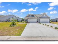 Charming two-story home with a two-car garage and landscaped yard at 528 Courtridge Loop, Conway, SC 29526