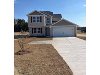 Charming two-story home with a two-car garage and a wide driveway at 775 Brown Swamp Rd., Conway, SC 29527