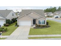 Charming single Gathering home features manicured lawn, two car garage and neutral tones at 1266 Brighton Hill Ave., Myrtle Beach, SC 29588