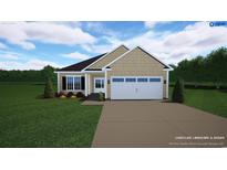 Beautiful single-story home boasting a neatly manicured lawn and a charming front entrance at 108 Infinity Ln., Loris, SC 29569
