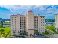 Aerial view of a luxury condo building near a marina at 2151 Bridge View Ct. # 2-902, North Myrtle Beach, SC 29582