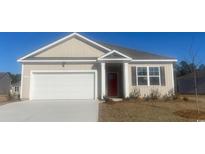 Charming single-story home featuring a garage and neatly landscaped front yard at 304 Glade Ct., Loris, SC 29569