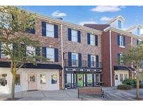 Brick building with multiple storefronts and apartments at 3565 Fountain Ln. # 3565, Myrtle Beach, SC 29577