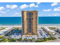 Stunning high-rise condo building with ocean views, parking, and beautiful landscaping near the beach at 9650 Shore Dr. # 1906, Myrtle Beach, SC 29572