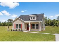 Charming single-Gathering home featuring red shutters, landscaped yard, and covered porch at 1168 St. John Rd., Galivants Ferry, SC 29544