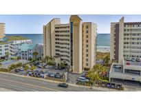 Oceanfront building with ample parking and nearby beach access at 517 S Ocean Blvd. # 605, North Myrtle Beach, SC 29582