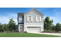 Charming two-story home with light gray siding, white trim, and a well-manicured lawn at 512 9Th Ave. S, North Myrtle Beach, SC 29582