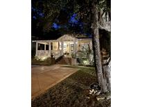 Charming house exterior with a welcoming front porch and landscaped yard at 1612 Edge Dr., North Myrtle Beach, SC 29582