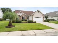 Charming single-story home with brick accents, well-manicured lawn, and a two-car garage at 109 Pheasant Run Dr., Murrells Inlet, SC 29576