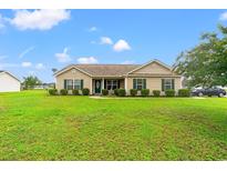 Charming single-story home with well-manicured lawn and inviting curb appeal at 719 American Beech St., Loris, SC 29569