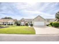 Charming one-story home with well-manicured lawn, attached garage, and inviting curb appeal at 812 Lalton Dr., Conway, SC 29526