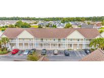 Aerial view of a multi-unit building with ample parking at 117 Butkus Dr. # 3, Myrtle Beach, SC 29588